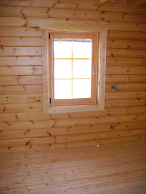 Window inside log cabin